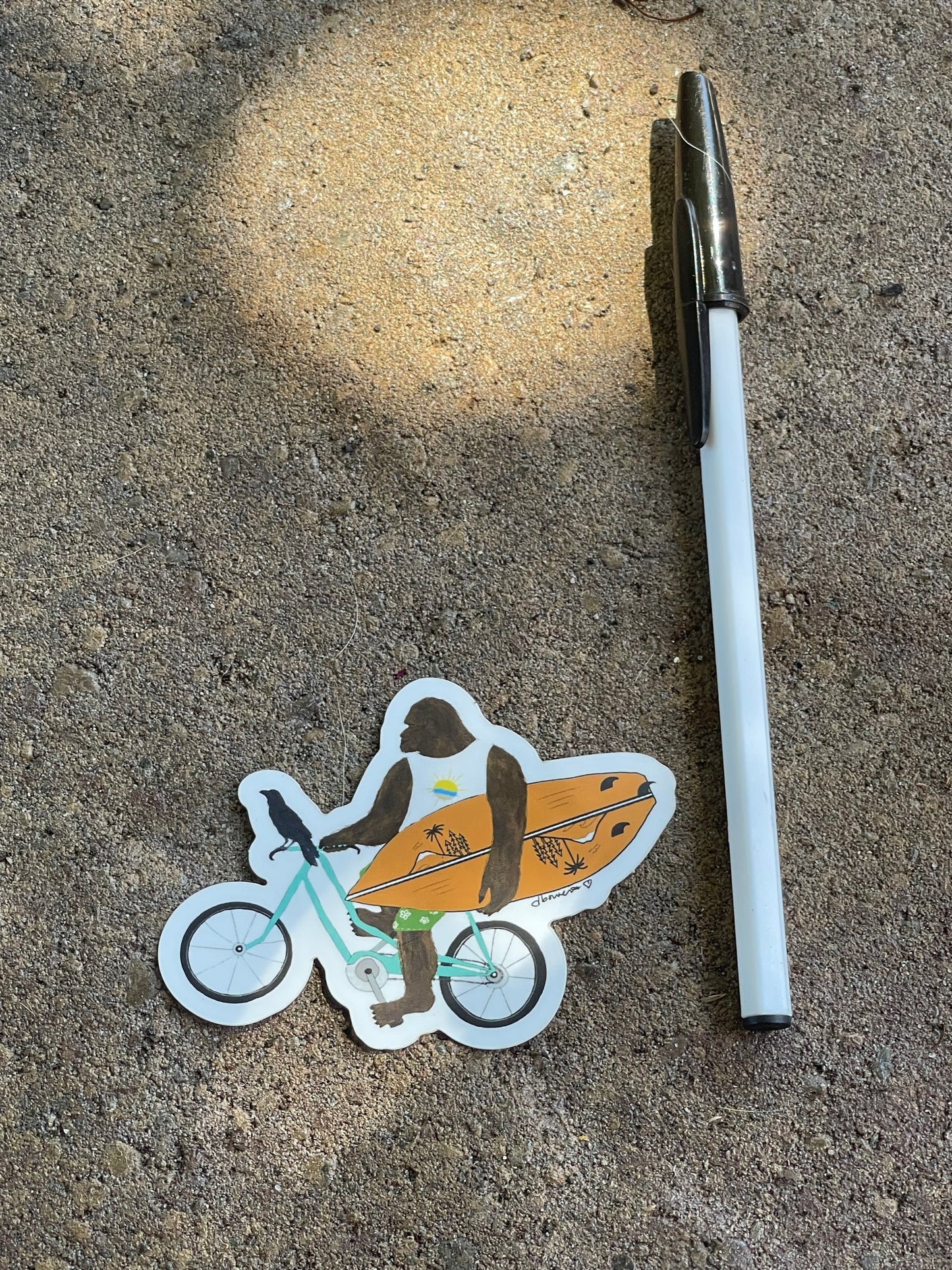 Bigfoot on Bike with Surfboard & Crow – Matte Die Cut Sticker