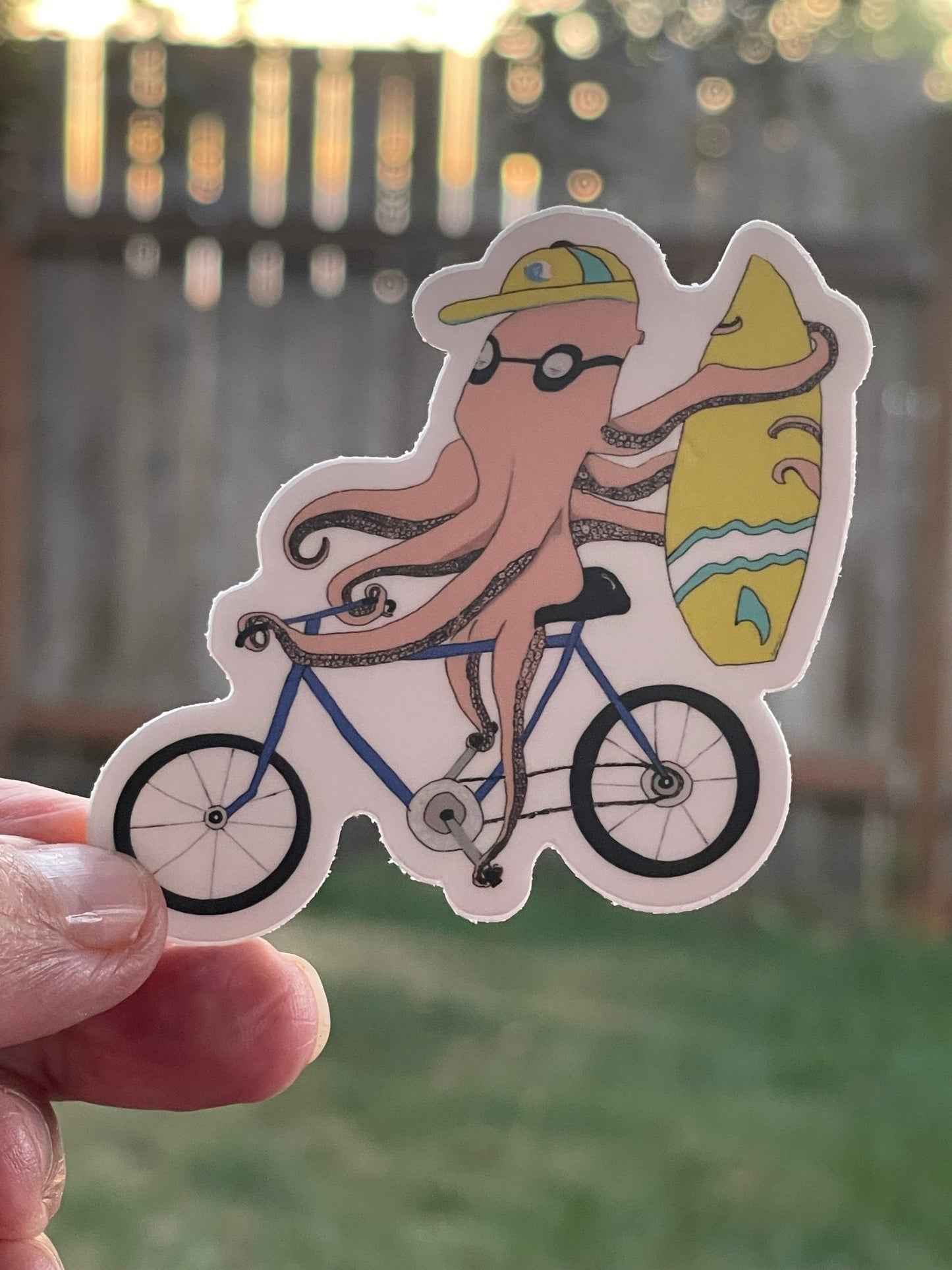 Octopus Riding Bike with Surfboard Vinyl Sticker - Funny Ocean Adventure Decal for Surfers & Cyclists - Color Crumbs Club