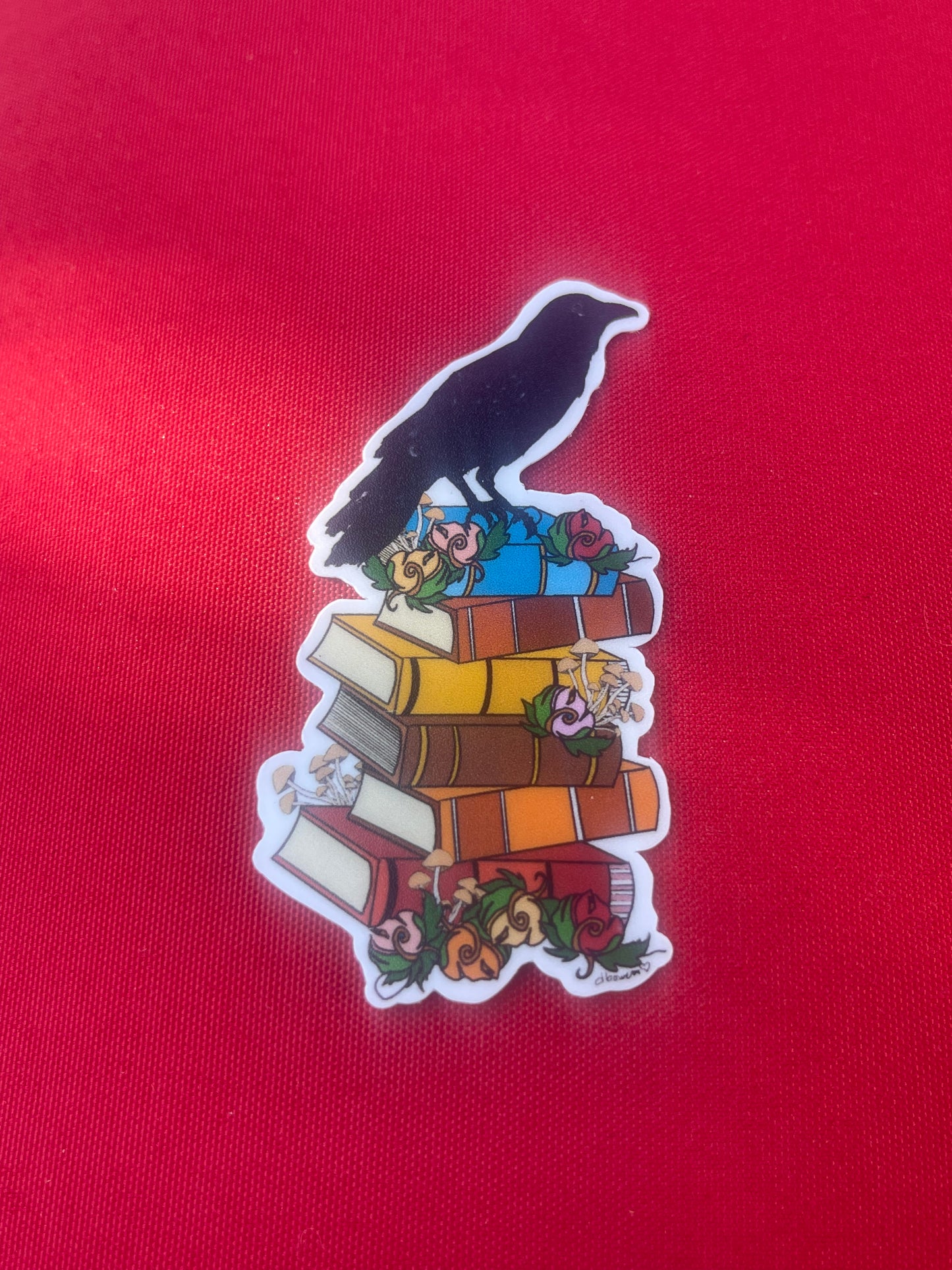 Crow on Stack of Books Sticker – Whimsical Literary Design