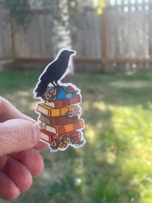 Crow on Stack of Books Sticker – Whimsical Literary Design