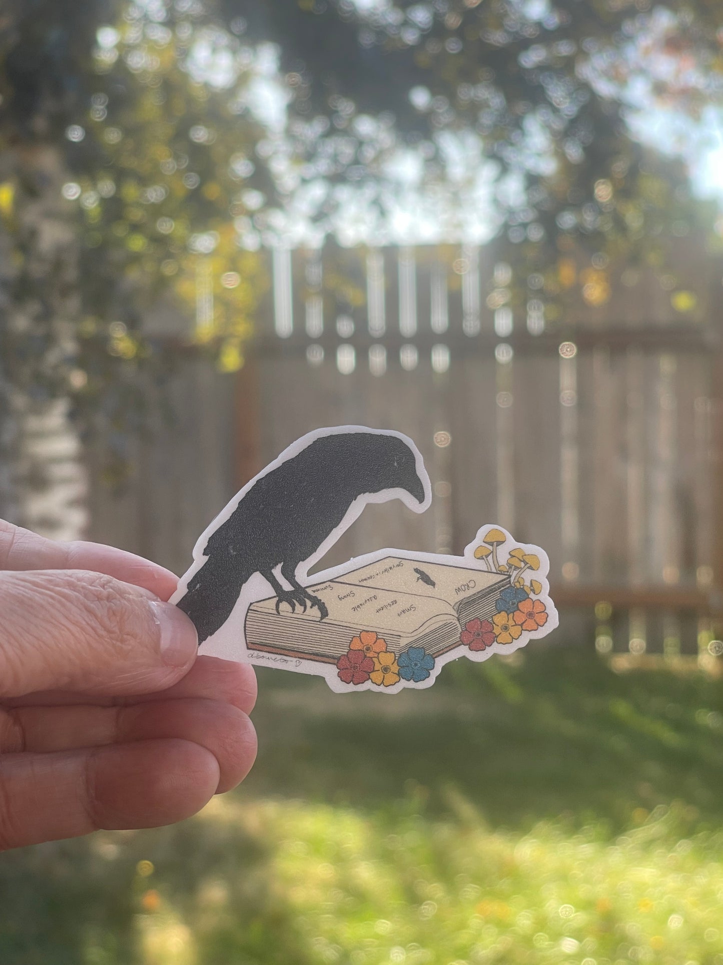 Crow on Open Book Sticker – Whimsical Learning Design