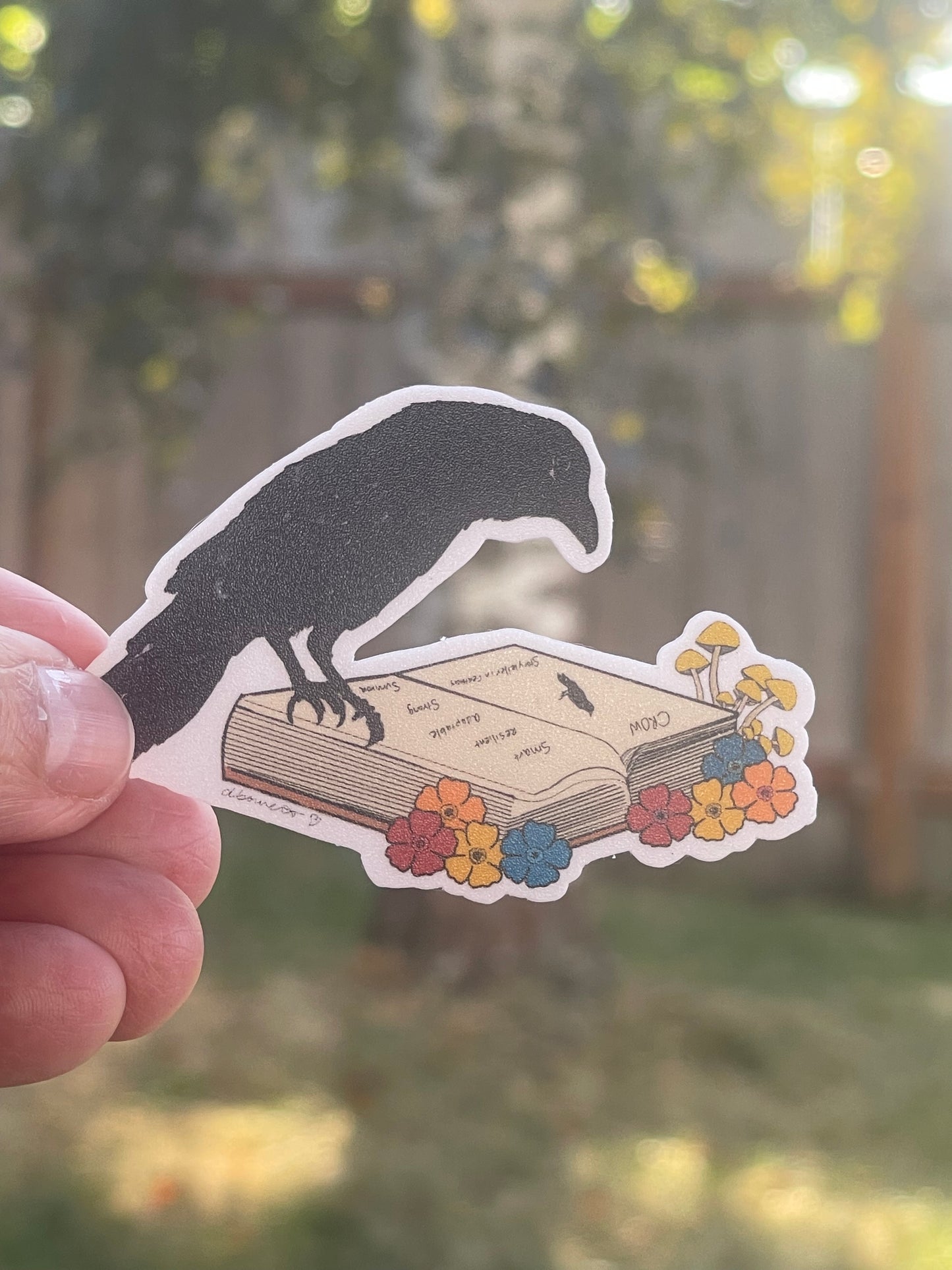 Crow on Open Book Sticker – Whimsical Learning Design