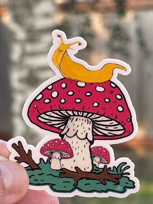 Banana Slug on Amanita Mushroom Vinyl Sticker – Whimsical Nature Design
