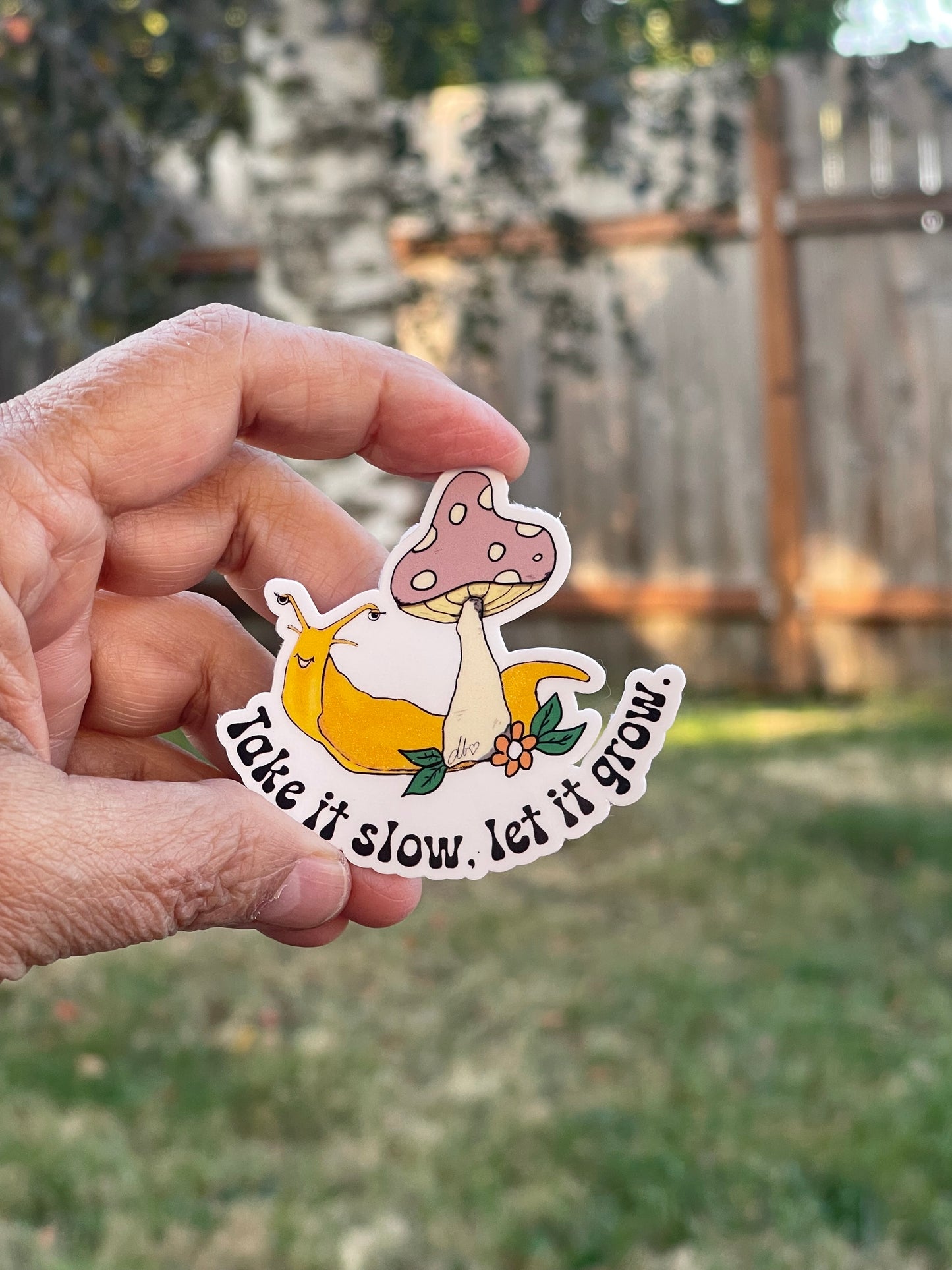 Take it Slow, Let it Grow Banana Slug behind Mushroom Vinyl Sticker – Whimsical Nature Design