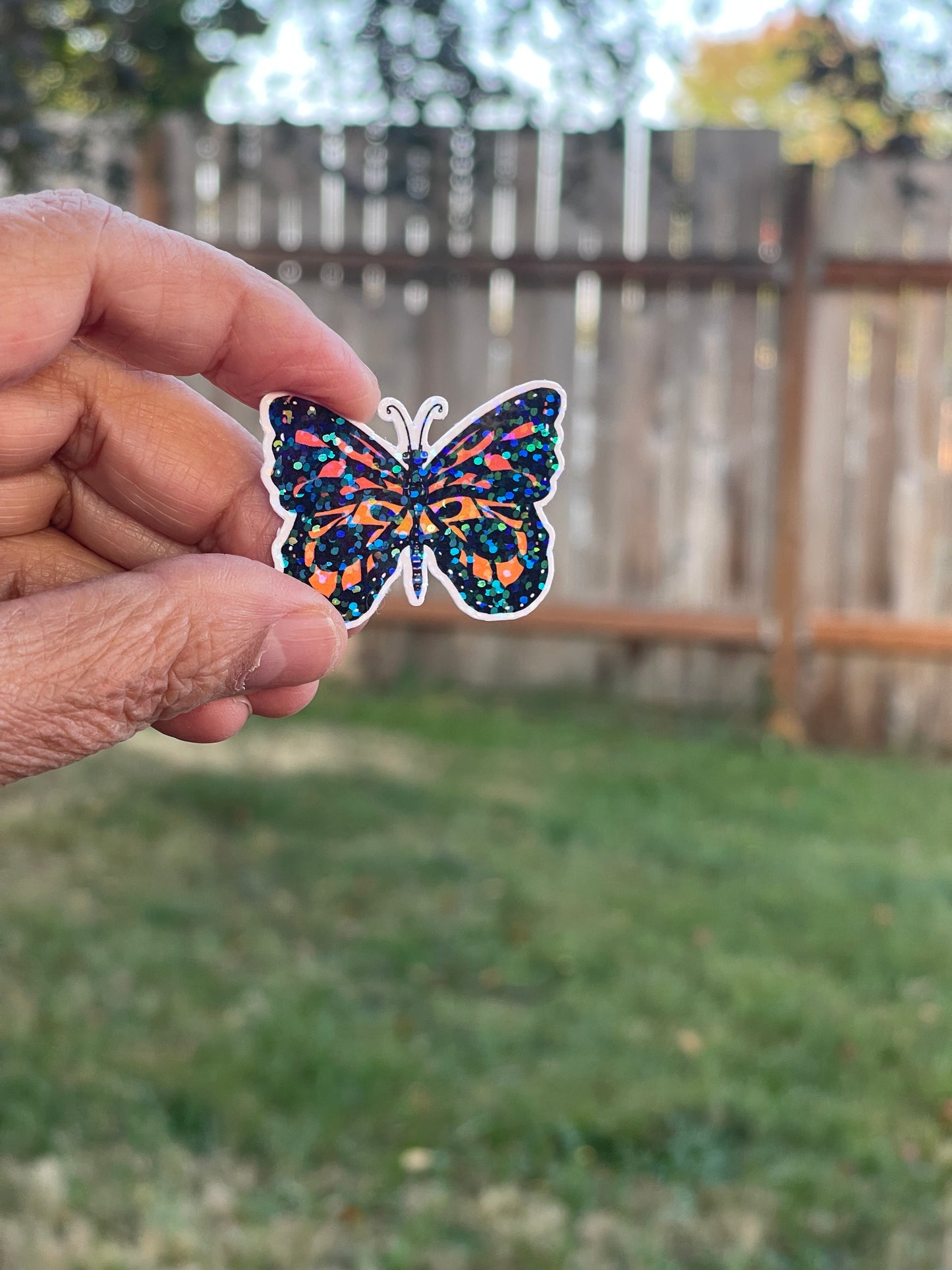 Orange Butterfly with Rainbow Glitter Vinyl Sticker – Bold & Shimmering Design