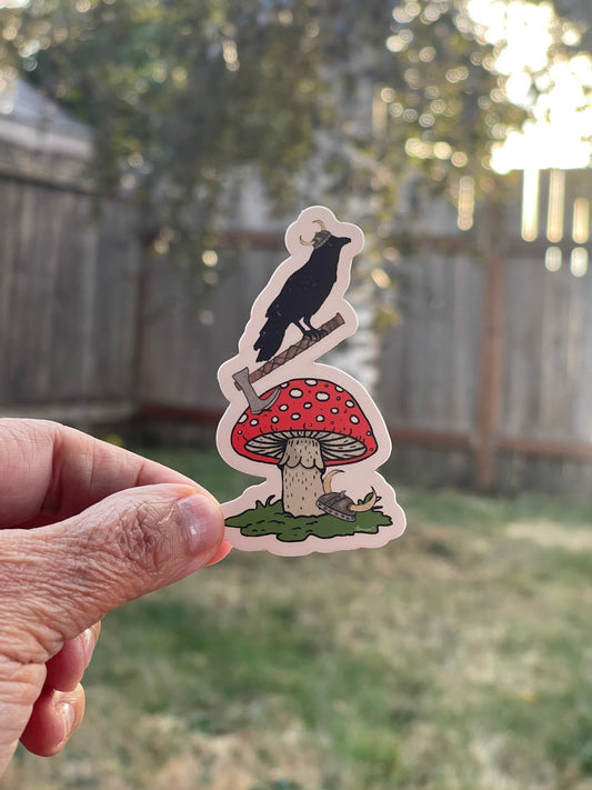 Amanita Mushroom Sticker with Axe and Crow – Red Toadstool Whimsical Forest Vinyl Decal - Color Crumbs Club