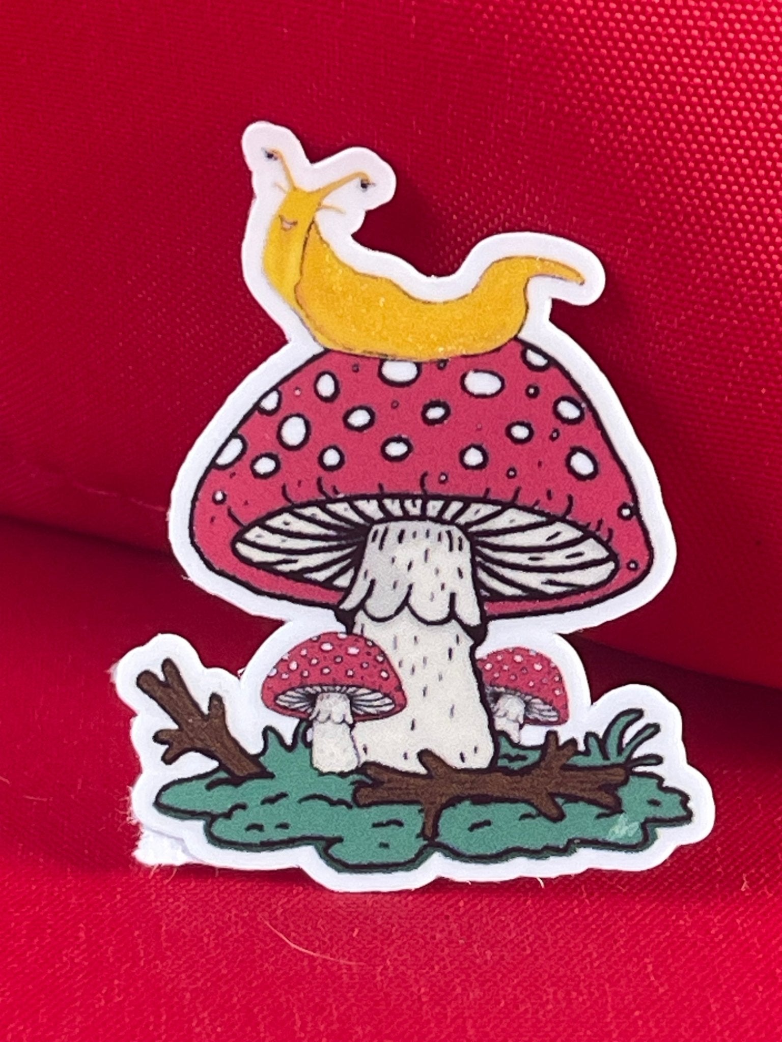Banana Slug on Amanita Mushroom Vinyl Sticker – Whimsical Nature Design - Color Crumbs Club