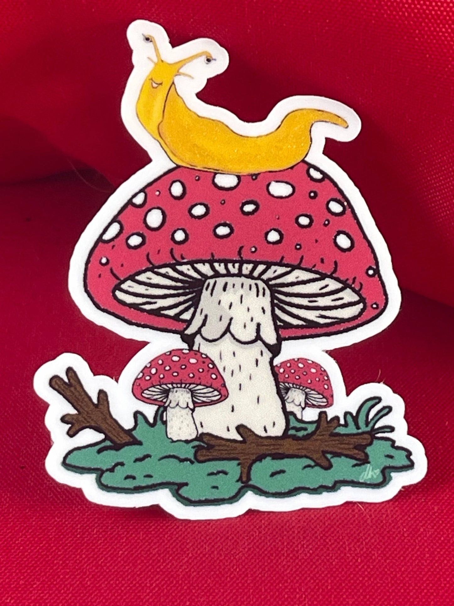 Banana Slug on Amanita Mushroom Vinyl Sticker – Whimsical Nature Design - Color Crumbs Club