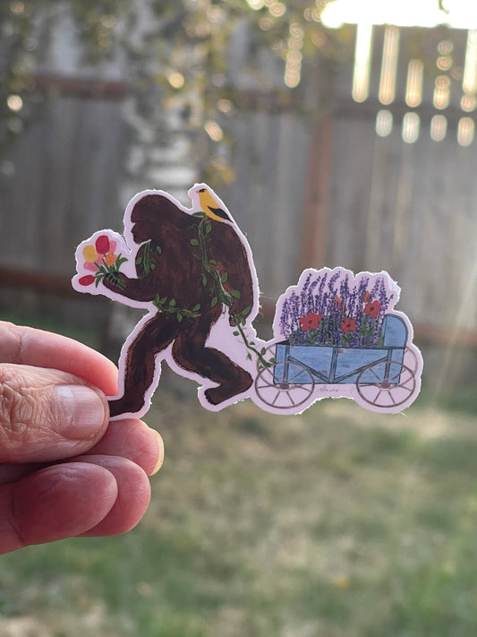Bigfoot with Lavender Cart Sticker – Whimsical Sasquatch Holding Tulips Vinyl Decal Die Cut Sticker - Color Crumbs Club