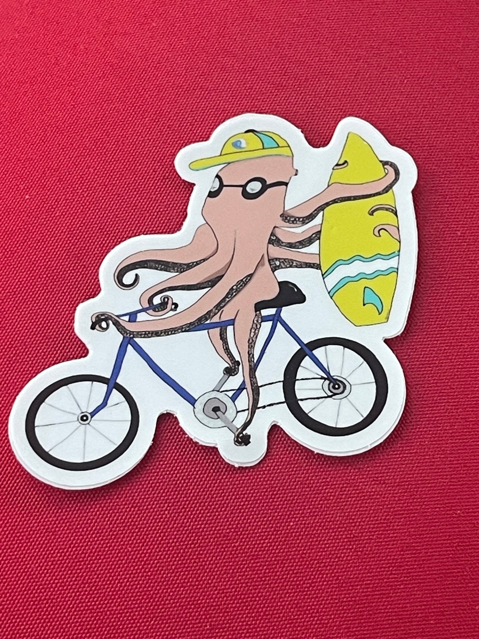 Octopus Riding Bike with Surfboard Vinyl Sticker - Funny Ocean Adventure Decal for Surfers & Cyclists - Color Crumbs Club